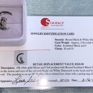 Owl with Half moon necklace: Round black and white diamonds. 10k gold.